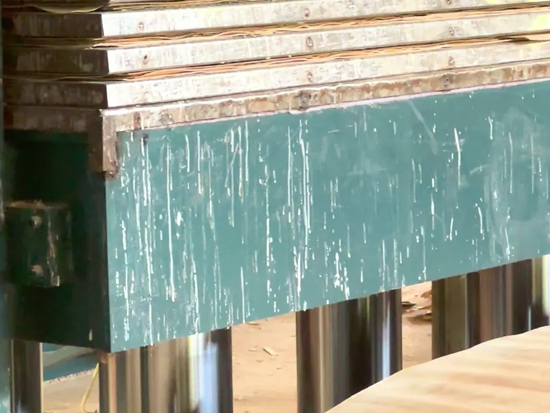 Non-face plywood sheets coming off the press at the Chalaka factory